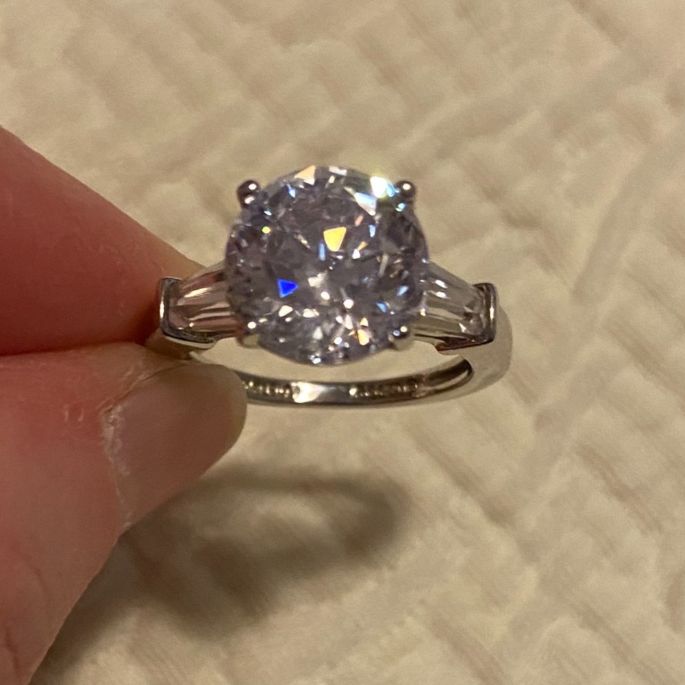 4.25 carat solitaire and baguettes